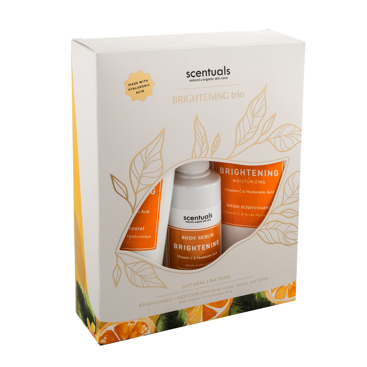 Scentuals Brightening trio containing brightening body scrub, serum, and lotion.